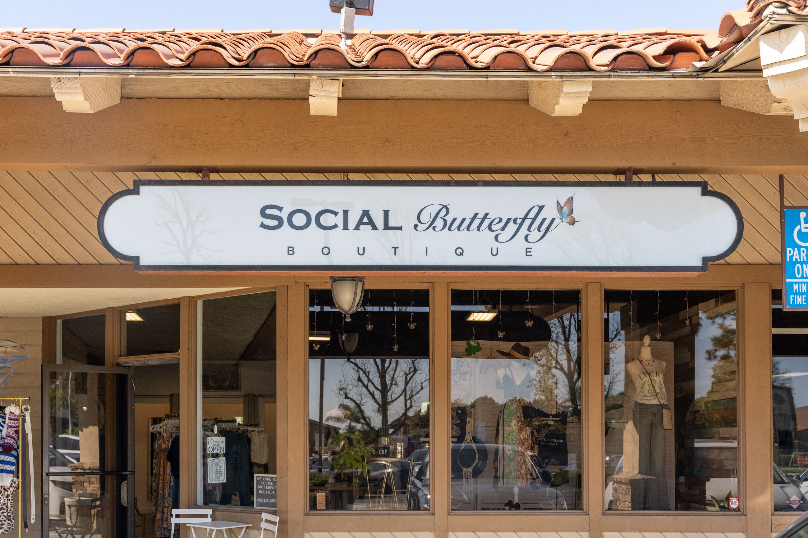 social butterfly boutique storefront
